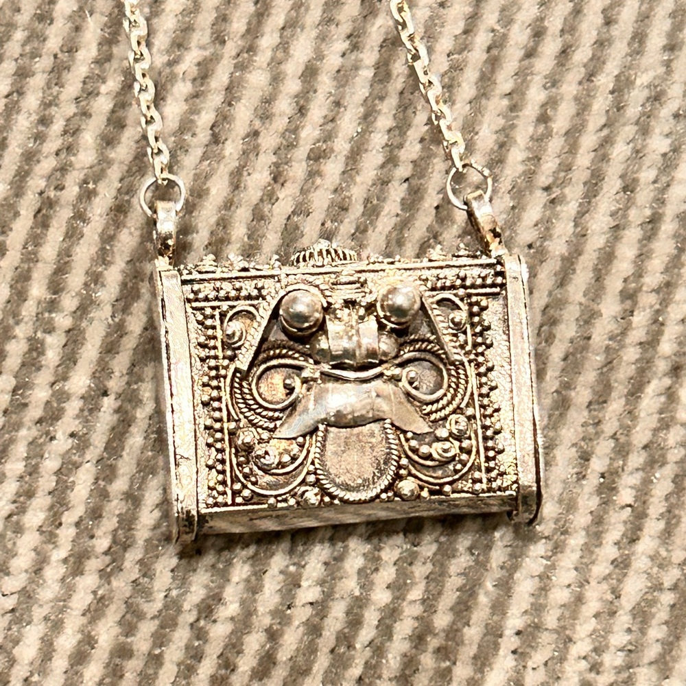 Bali Barong-inspired prayer/pill box locket necklace made of sterling silver